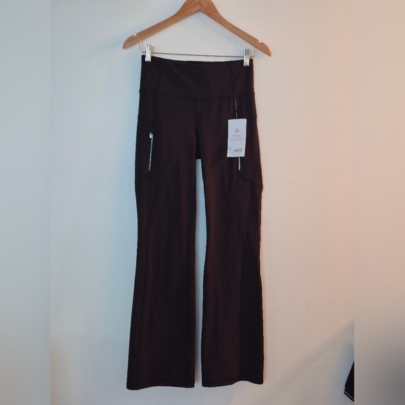 NWT Athleta Rainer Bootcut Pant Reflective Zip Pockets Compression Black Size S - Picture 4 of 10